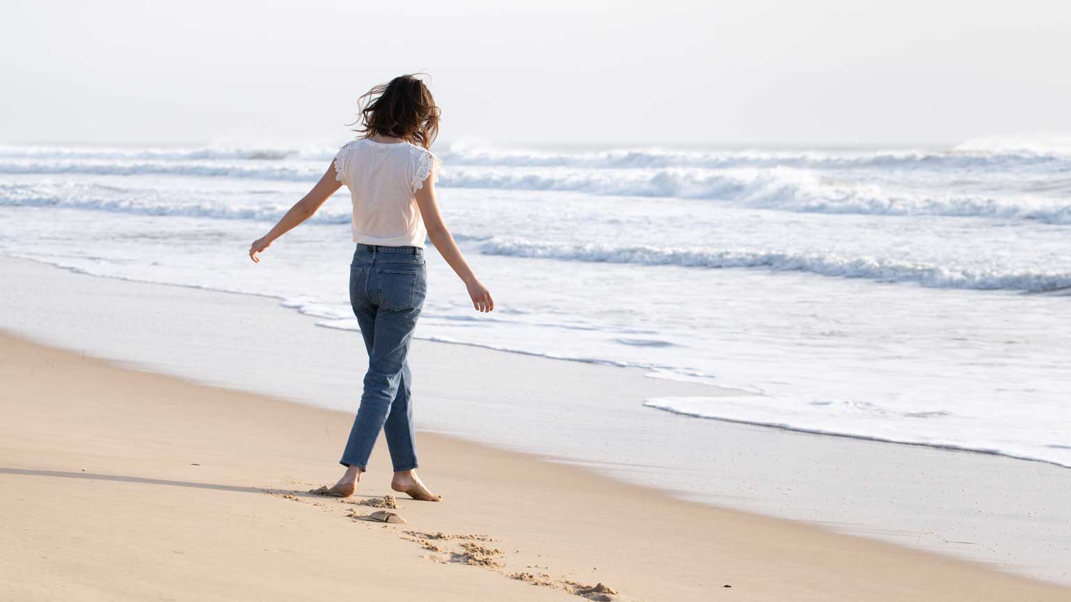 Traces de Pas sur la plage